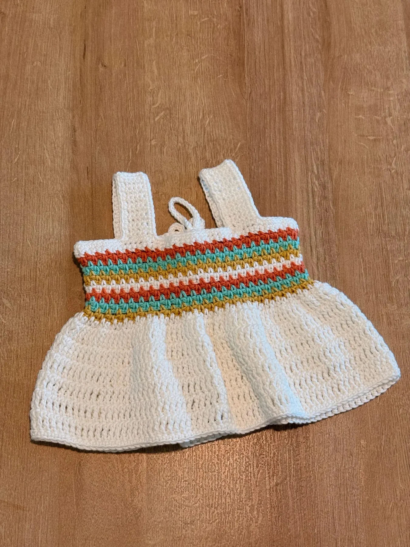 Finished cream Coastal Stripes tank with orange, teal, and yellow stripes